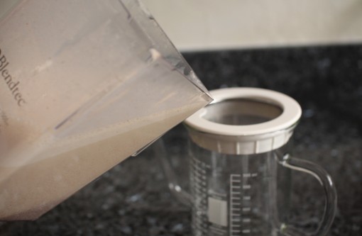 Straining almond milk