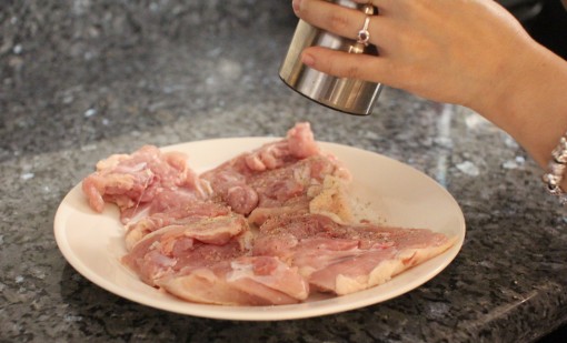 seasoning the other side of the chicken