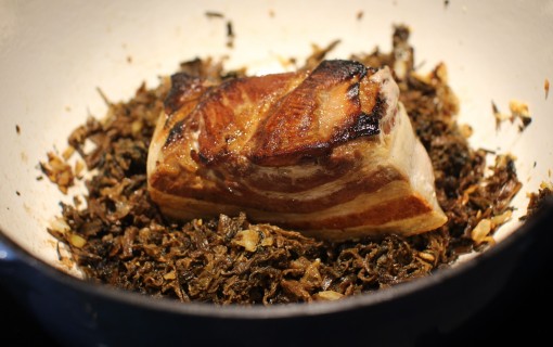 pork belly on top of mustard