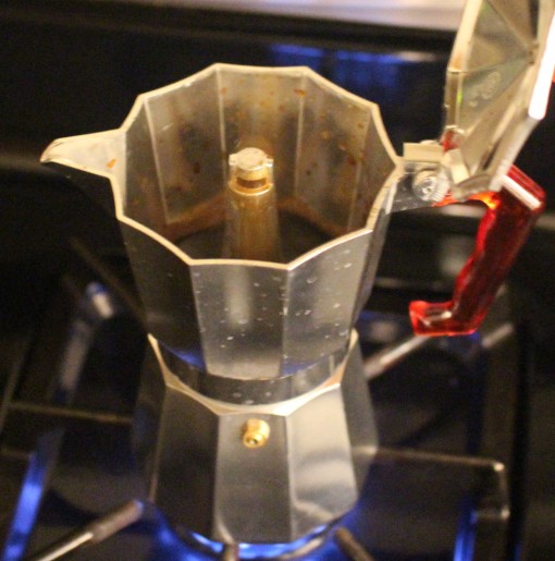 Coffee filling up the Moka Pot